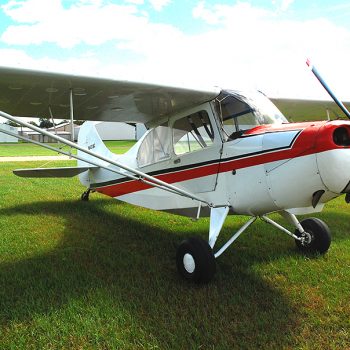 Champion 7EC on grass airport